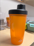vibrant orange shaker bottle from CRIVIT